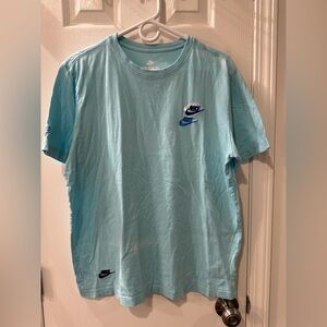 FLAWED Nike Women's Light Blue Short Sleeve Tee